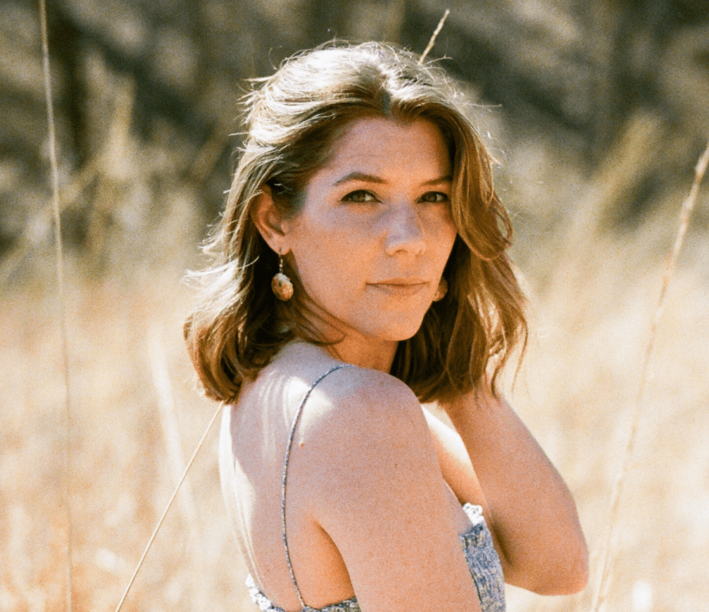 A Curtain Drawn, a Heart Revealed – Lora Kelley’s ‘Man Behind the Curtain’